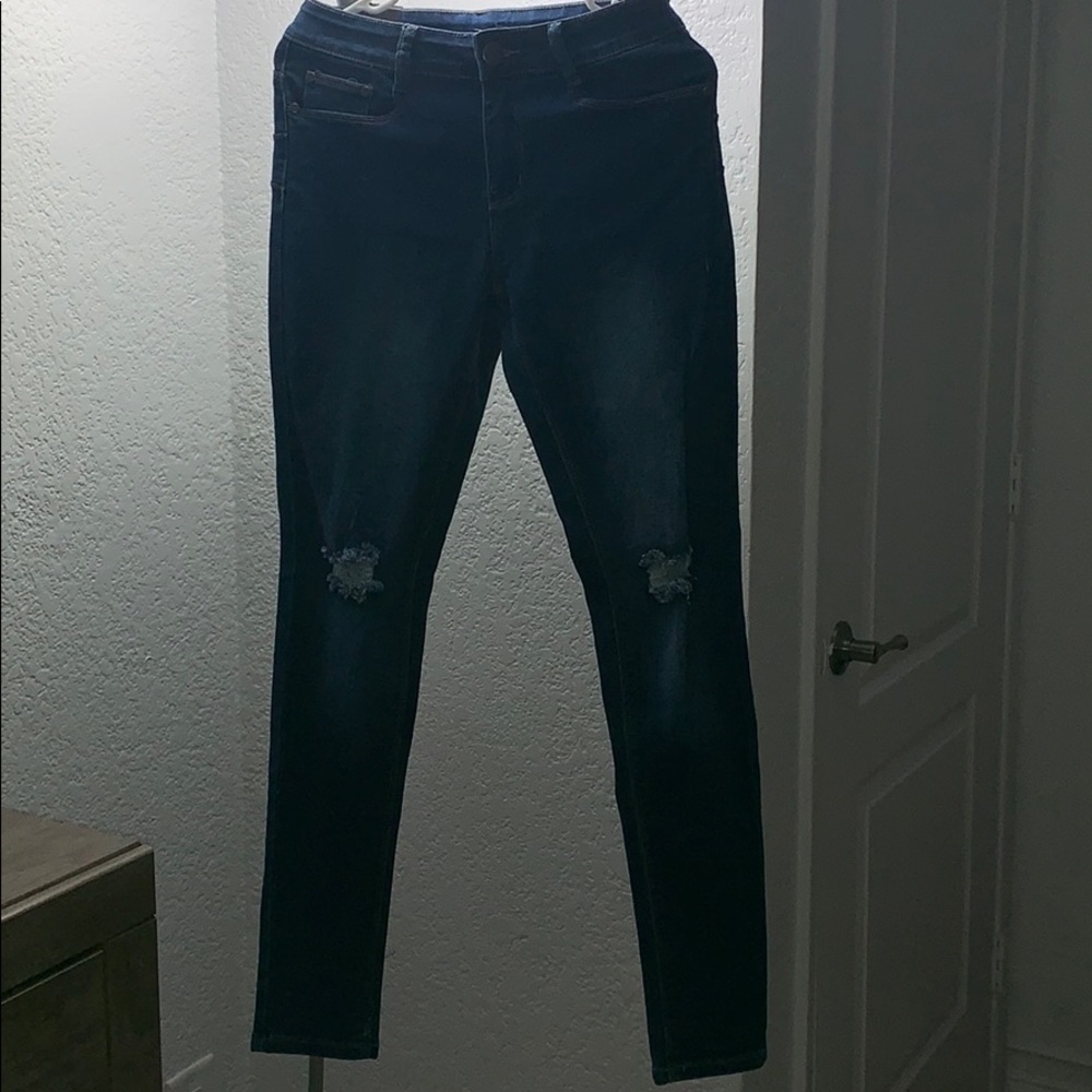 Dark washed ripped jeans